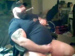A Big Bellied, Cigar Chompin' Bear Strokin'